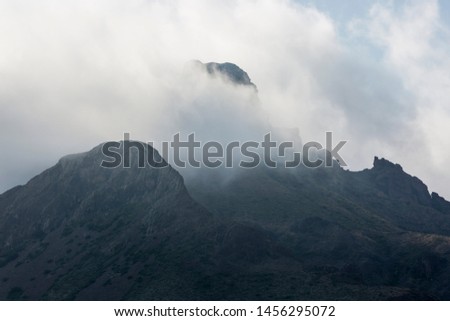 Clouds rolling over the mountaintops of the Chisos Basin in Big Bend National Park (Texas).