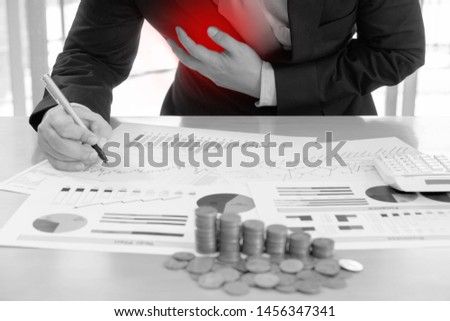Businessman clutching his chest from acute pain. Heart attack symptom-Healthcare and medical concept