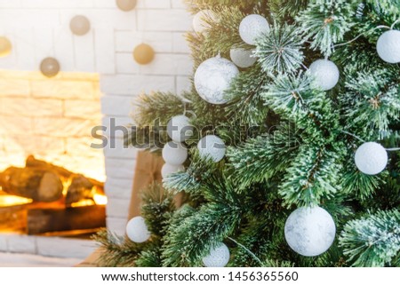 Christmas decoration and ornaments on rustic wooden background. Retro style dark colored picture with light effects