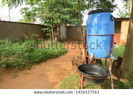 Rural hand washing basin for toilet hygiene Royalty-Free Stock Photo #1456527563