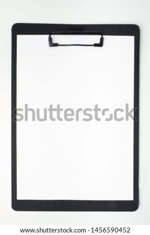 Isolated empty black clipboard and white paper (officeware, tool or stationery).