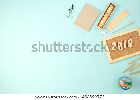 Back to school concept, School and office supplies on pastel pale blue background. Office desk with copy space. Flat lay.