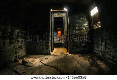 Old train carriage interior with light intruding