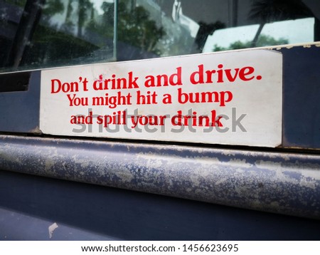 Don't drink and drive. You might hit a bump and spill your drink message.