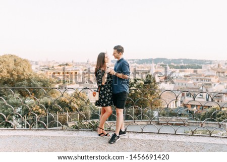 Wedding photography in Italy. Couple walking the streets of Rome, sightseeing and panoramic views. 