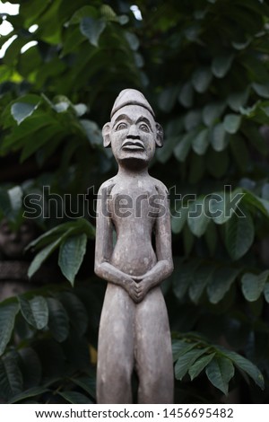 Traditional Dayak (native tribe of Borneo) wood sculpture/totem that used for religious activity in Pulau Kumala, Tenggarong, Kutai Kartanegara, Indonesia