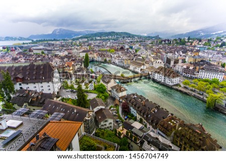 Aerial shot of Lucerne city and the river reuss flowing through the city. 