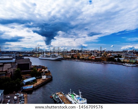 Panorama of the city, river and ship 