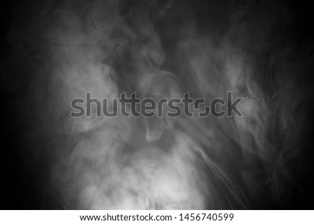White smoke isolated on black background.  Dust cloud on black background.