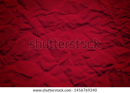 Paper texture, a sheet of red wrinkled paper