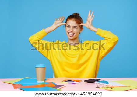 Cheerful female designer desktop coffee morning joy