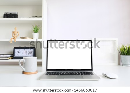 Workspace desk and laptop. copy space and blank screen. Business image, Blank screen laptop and supplies. Royalty-Free Stock Photo #1456863017
