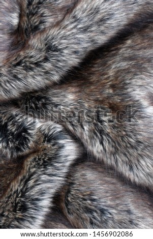 Wolf fake fur texture background
