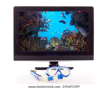 TV set with undersea picture on the screen with snorkeling equipment near
