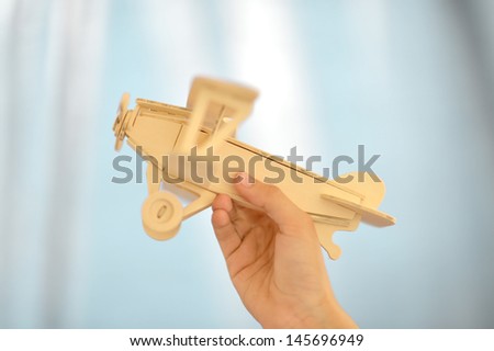 close-up of a wooden airplane
