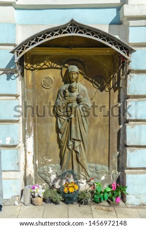 Wood carving entrance door of orthodox Church picturing Mother Mary and Jesus baby, Moscow