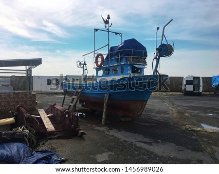 Maintenance and repair of a fishermann boat at Selimpaşa Port of Istanbul city.