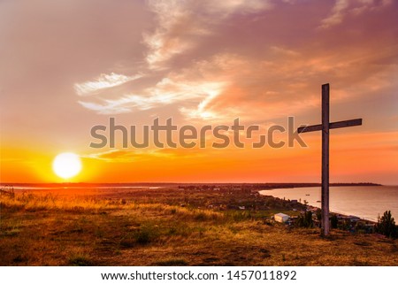 Crucifixion of Jesus Christ - Cross At Sunset. 