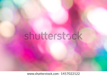 Abstract blur sequin dress colorful bokeh neon light. Design backdrop. Disco color