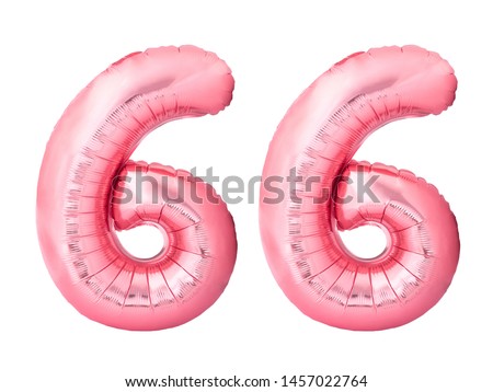 Number 66 sixty six made of rose gold inflatable balloons isolated on white background. Pink helium balloons forming 66 sixty six number