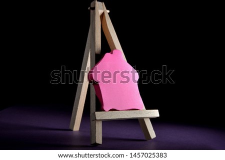 easel with a house icon on it
