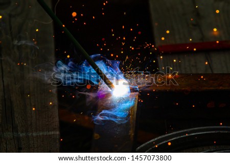 Electric welding spark of fire smoke