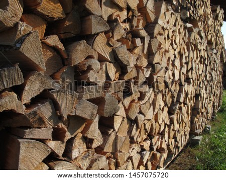 Unique pattern triangular firewood neatly stacked