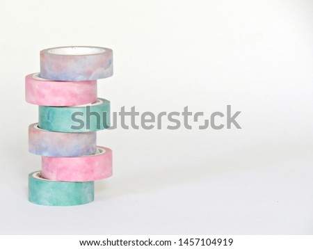 Colorful washi tapes on white background Craft supplies DIY