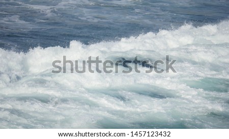 Beach with waves crashing at the ocean shot in high resolution 