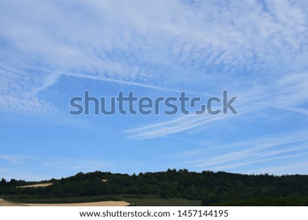 light cloud textures on blue sky