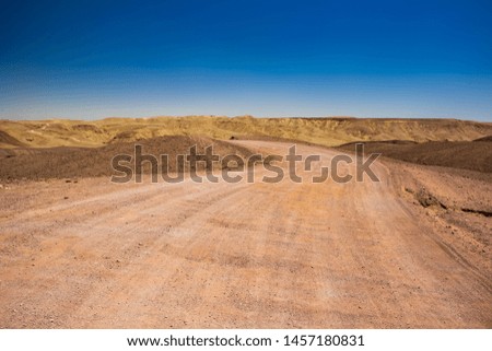 desert trail country side off road location with sand valley around and mountain background in Middle East hot natural environment 