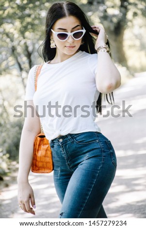 Cheerful woman portrait. Nature background