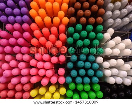 Colorful pen on the shelf