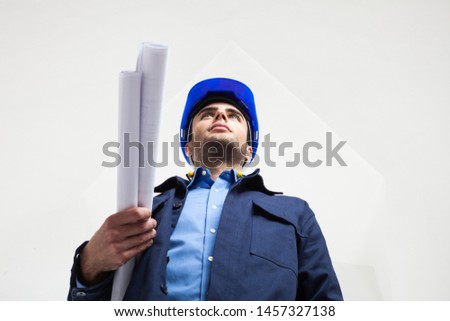 Portrait of a worker in a white room