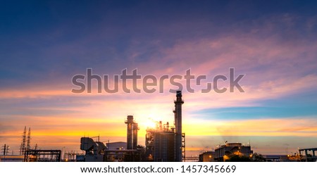 Energy power plant of industrail refinery oil and gas at twilight. -silhouette image Royalty-Free Stock Photo #1457345669