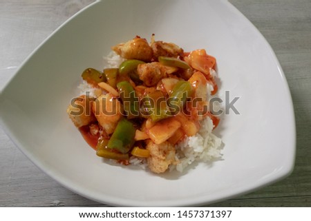 Sweet and sour chicken close up.