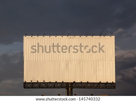 Blank, realistic advertising construction on dark sky before rain