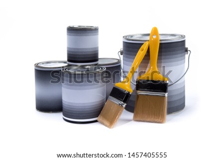 an assortment of different sizes large and small paint cans and large and small yellow handle paint brushes  isolated on white