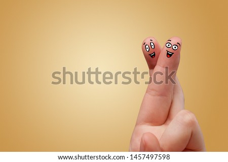 Happy face fingers hug each other