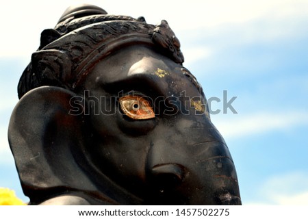 Close up black Ganesha statue  ganesha is hindu god god of Success at Tiger Tiger Cave Temple Krabi, Thailand