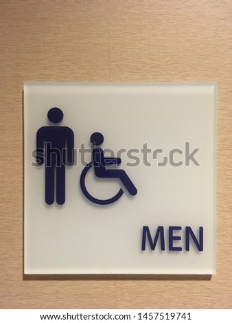Men’s restroom and handicapped accessible restroom sign