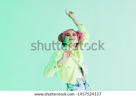 woman with pink hair smiling make up neon