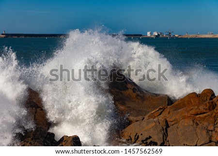 Splashing Atlantic ocean wave at Portugal coast.