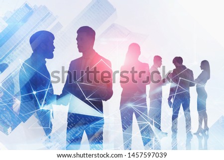 Silhouettes of business people in city with double exposure of digital network hologram. Concept of internet connection and data transfer. Toned image