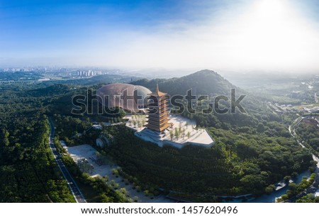 Pagoda on Top of Niushou Mountain in Nanjing city in a sunny day. This photo was taken with a drone flying in the air.