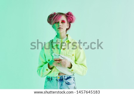young stylish woman in green jacket