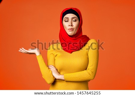 woman in red burqa work                               