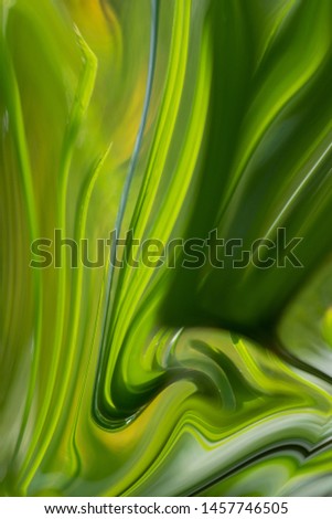 Green leaves liquid rippled oil paint wave form, brightness ranged from lightness to darkness tones with reflection. Abstract in shape, form, content and meaning. Beautiful and inspirational indeed.
