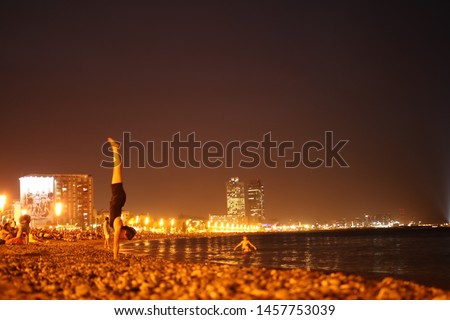 hand standing in the beach