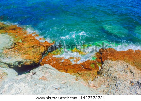Sea Splashed on Rocks, Blue water on Corals
